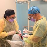 Cosmetic dentist North York team treating a patient at Vita Dentistry